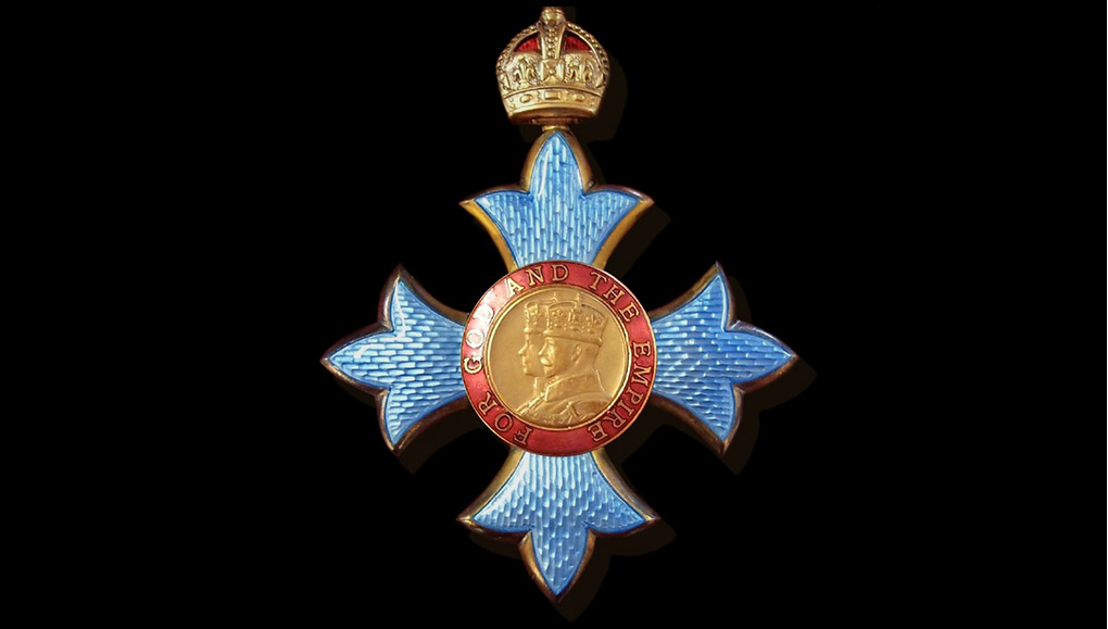 Close-up image of honorary knighthood medal.